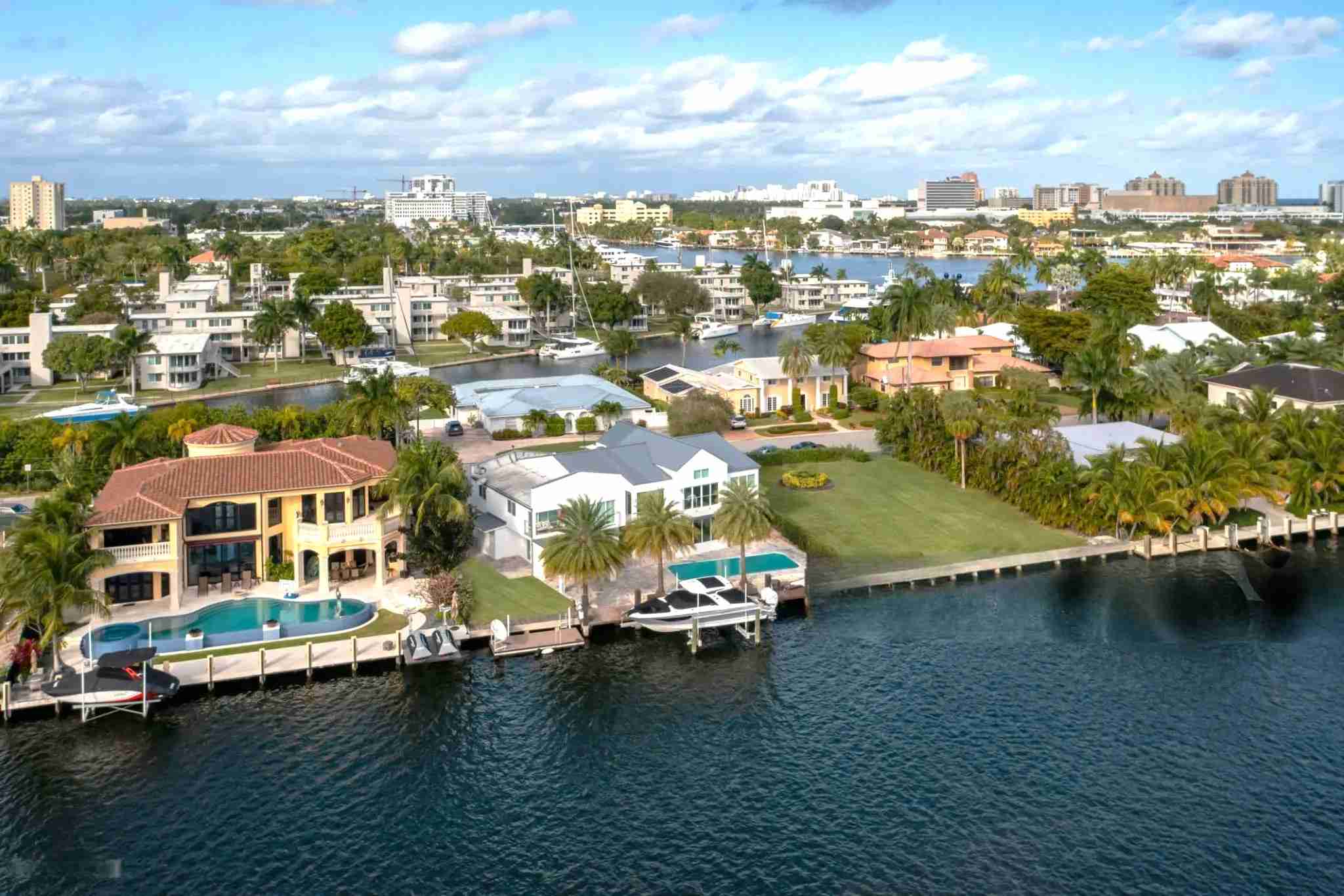 Scenic waterfront kosher villa in Miami with palm trees and ocean views